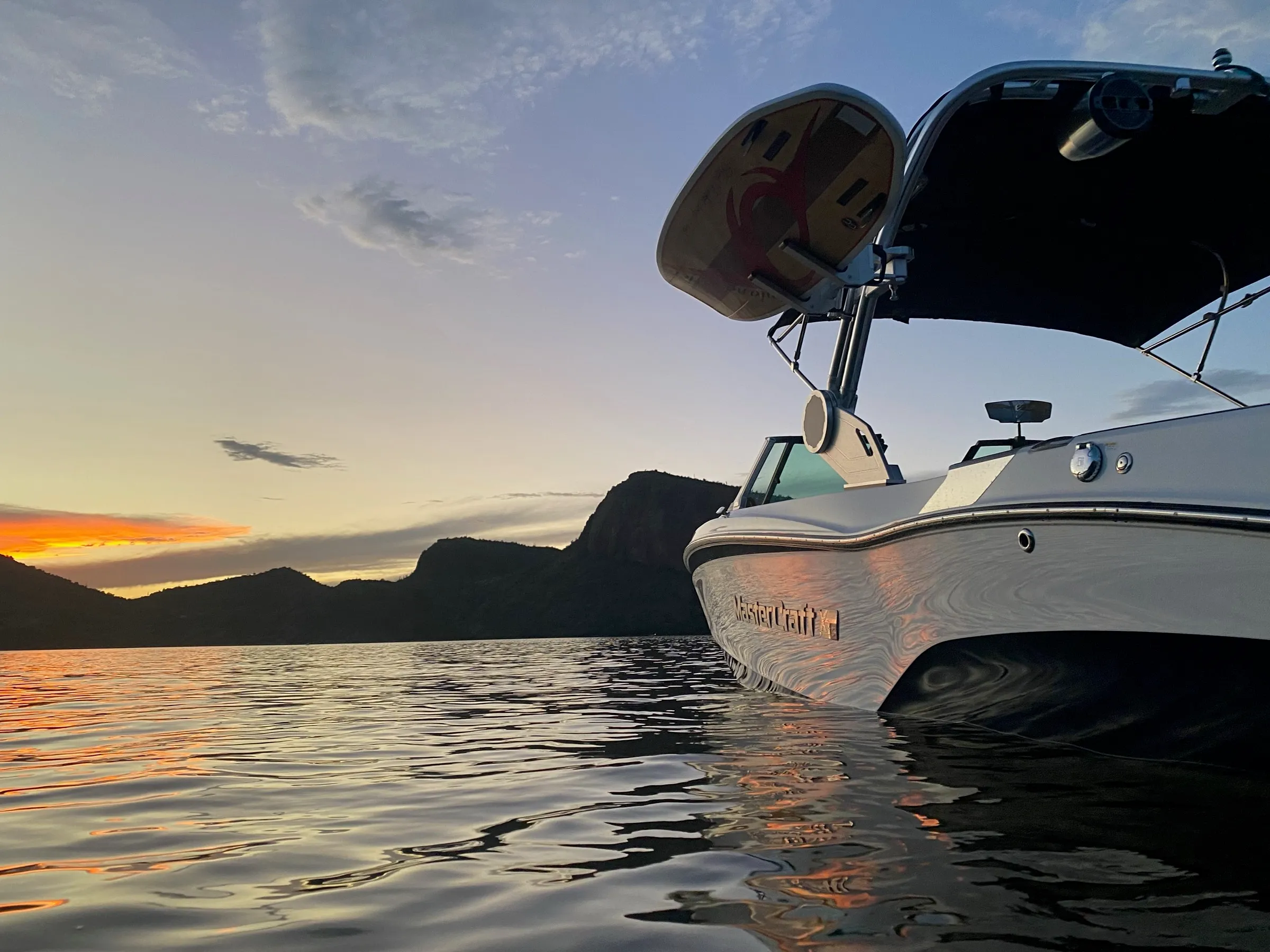 2022 MasterCraft XT22 at sunset on the water